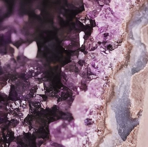 purple crystal image in such detail as to appear abstract